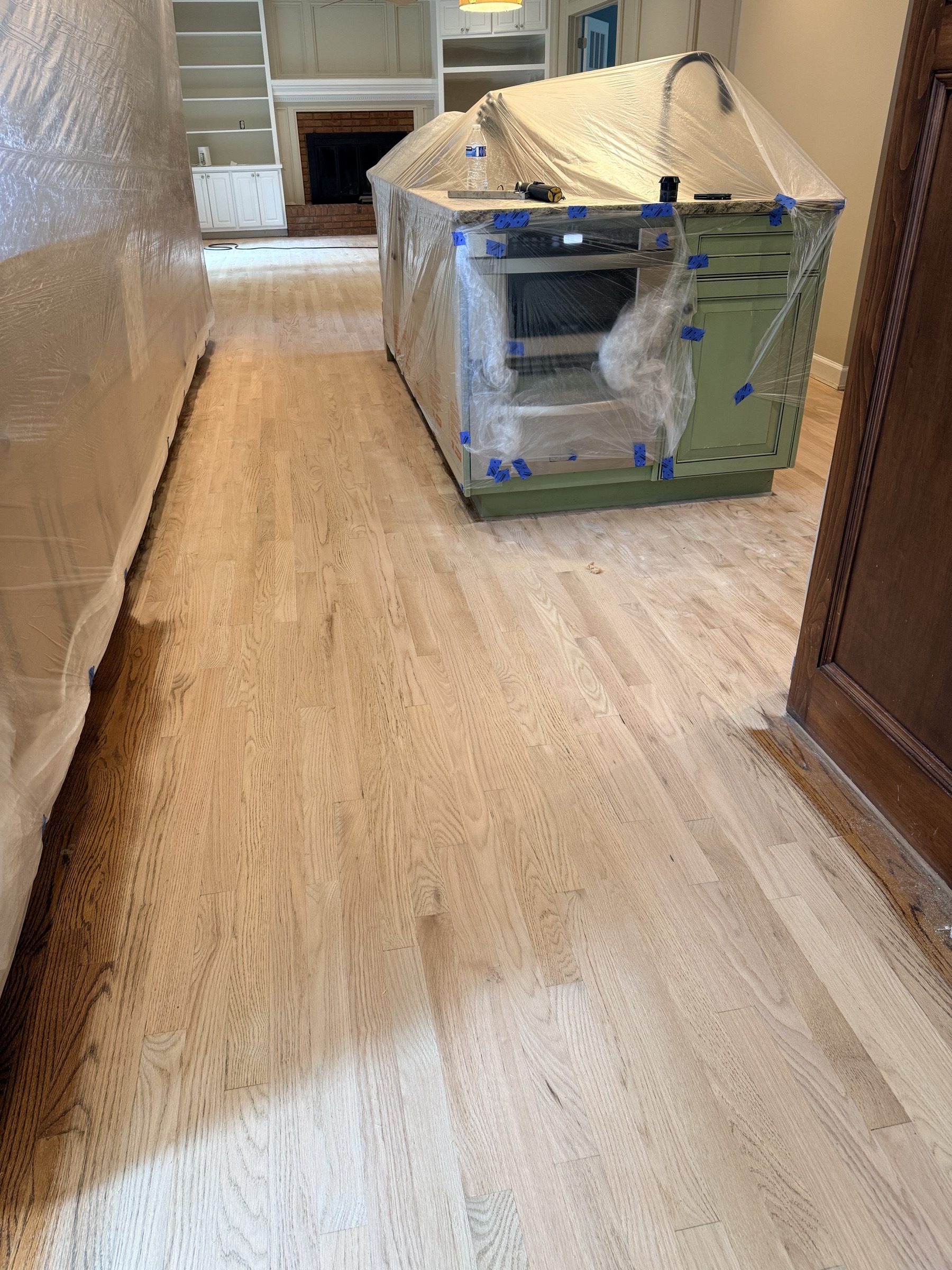 Drum sanding a hardwood floor in the Duluth, GA area by Atlanta Floor One