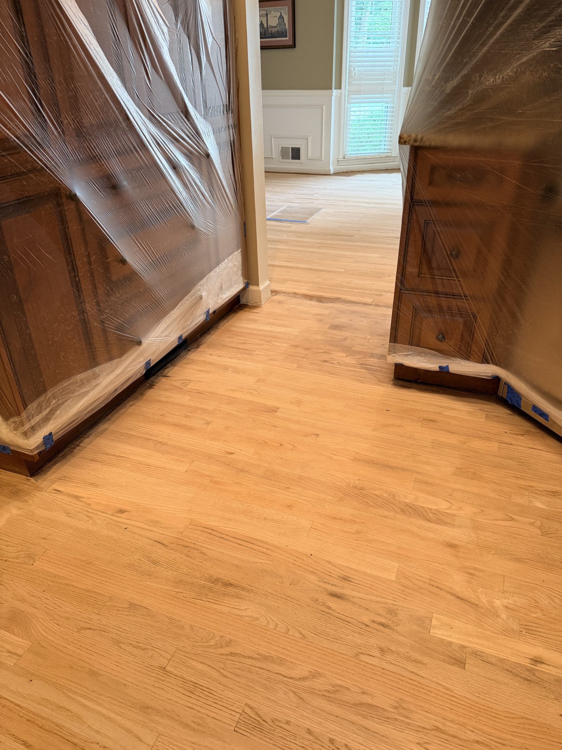 Drum sanding a hardwood floor in the Duluth, GA area by Atlanta Floor One