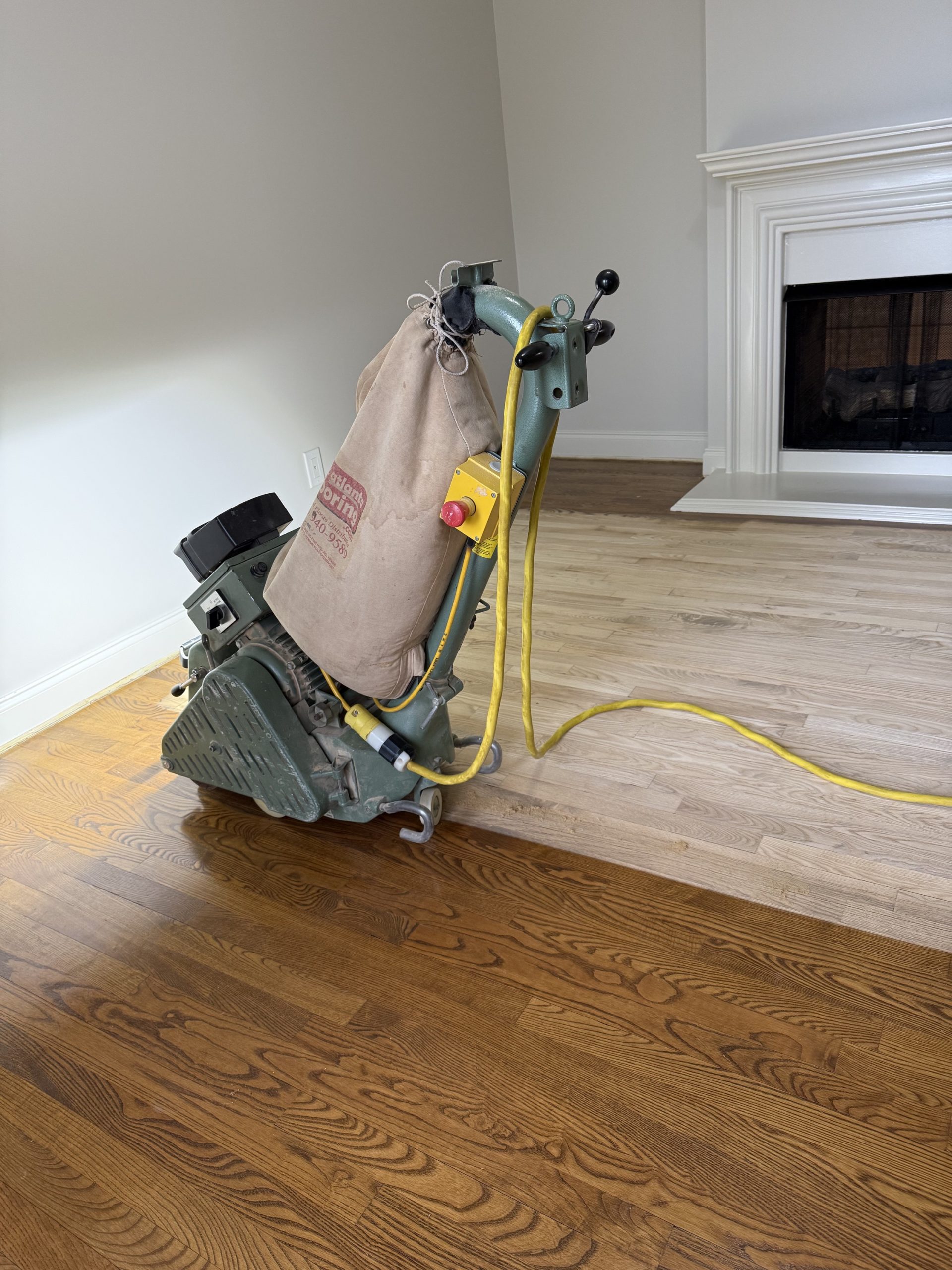 Hardwood floor sanding with a drum sander by Atlanta Floor One