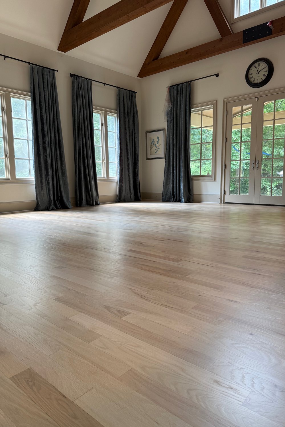 White oak floor in a Suwanee, GA great room after sanding, sealed with Bona Nordic Seal and finished with Bona Traffic
